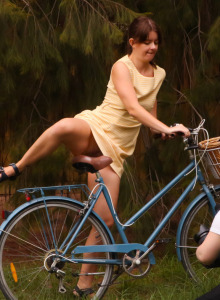 Hot brunette Grace is cycling in the park in yellow summer dress and relaxing nude at home showing her erected nipples and hairy vagina