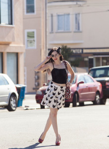 Tall hot brunette Paris Moffer at street wearing white dress, black top and high heels